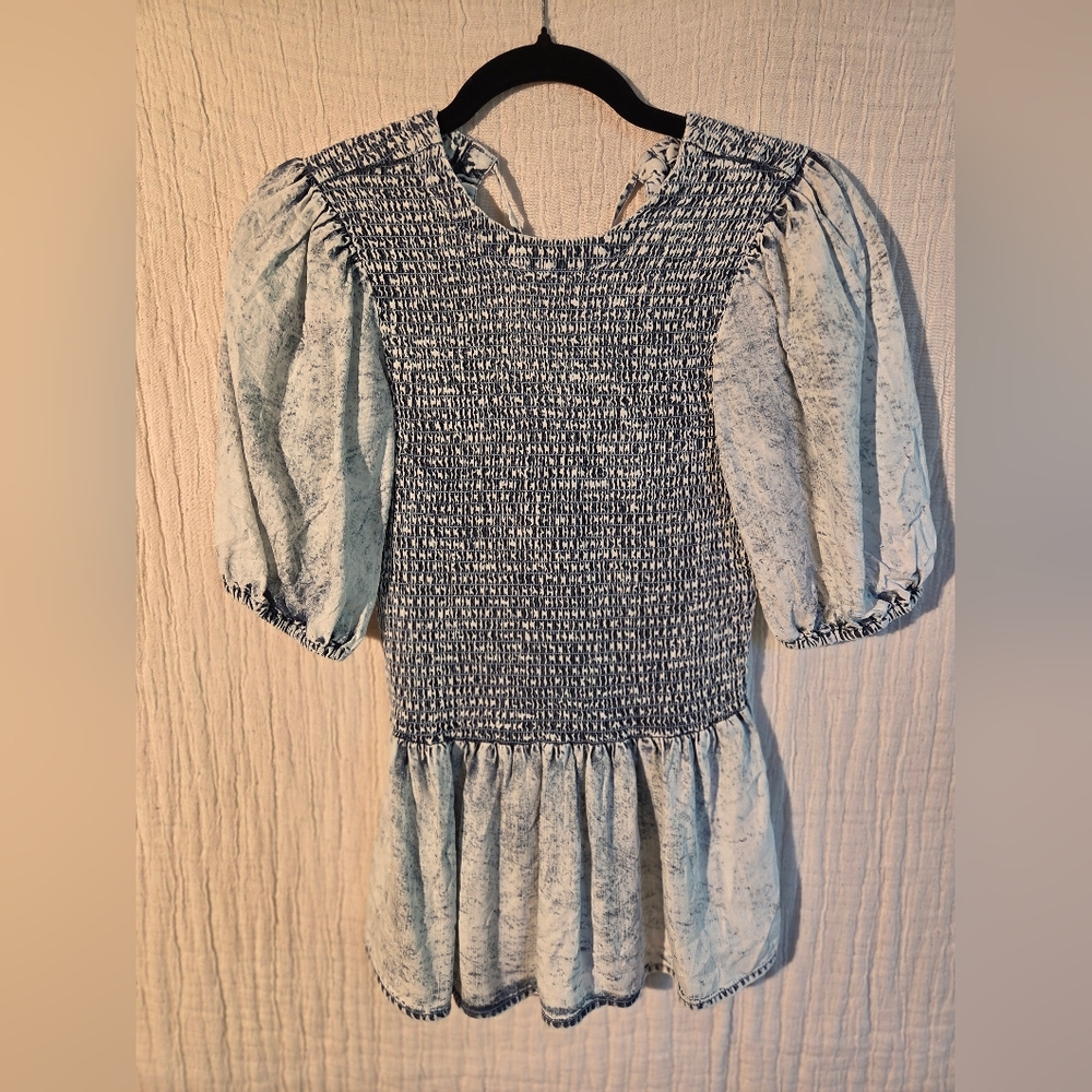 Given Kale Acid Washed Smoked Shirt With Peplum Bottom.